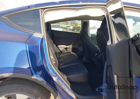 2023 Tesla Model Y Awd/Long Range Dual Motor All-Wheel Drive z USA, uszkodzony, nr VIN 7SAYGDEE7PF707315